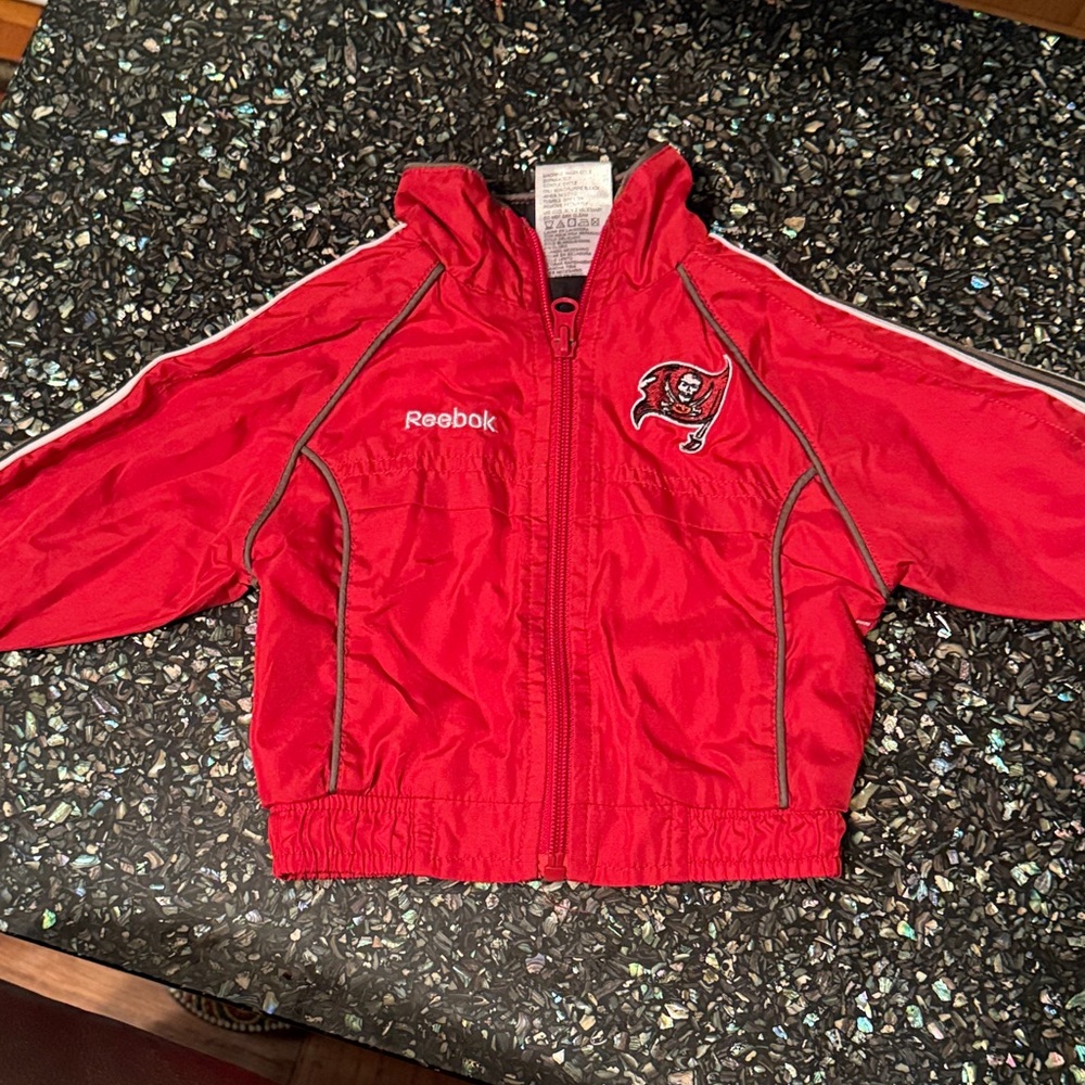 Reebok Kids Red Raincoat, wind breaker with Buccaneers Logo